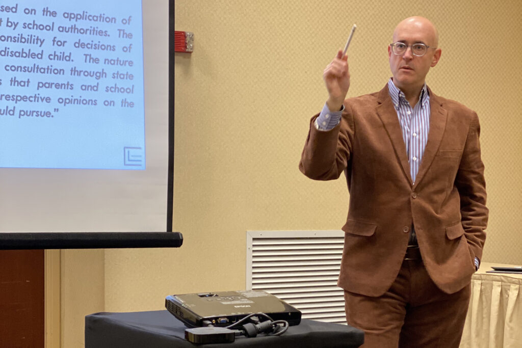 John lecturing